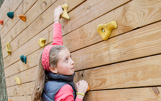 girl on a climbing wall